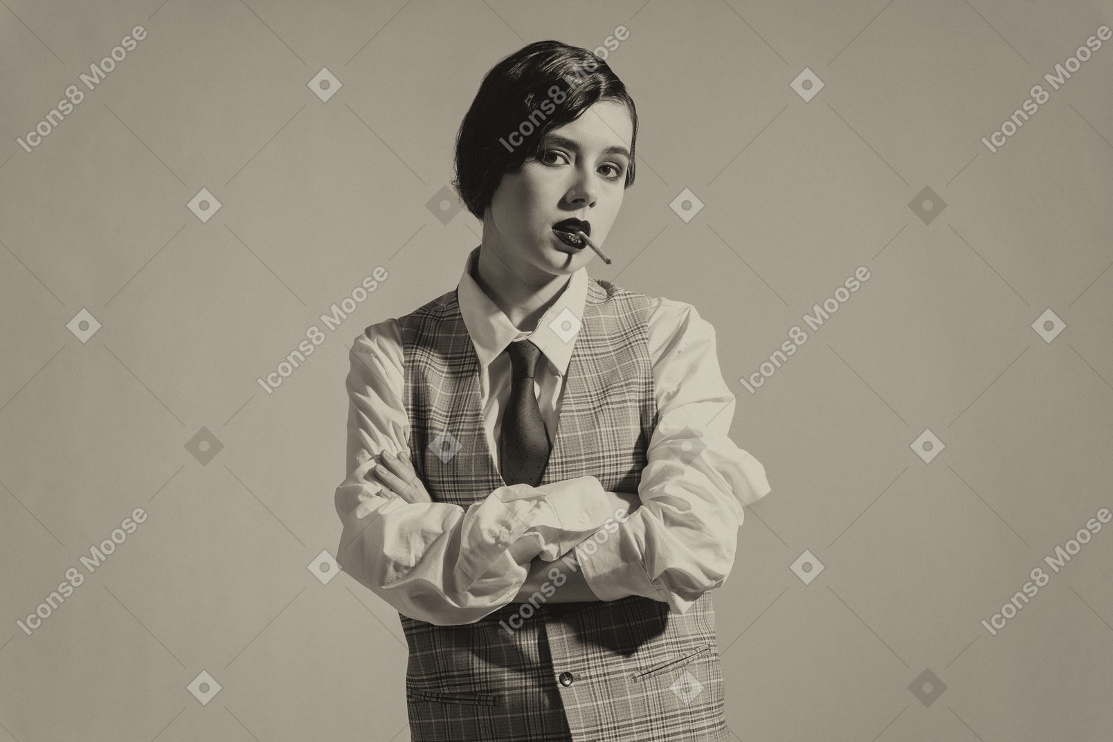Confident old-fashioned lady posing with crossed hands
