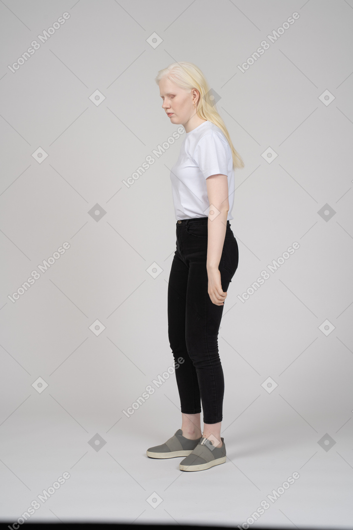 Side view of a girl standing