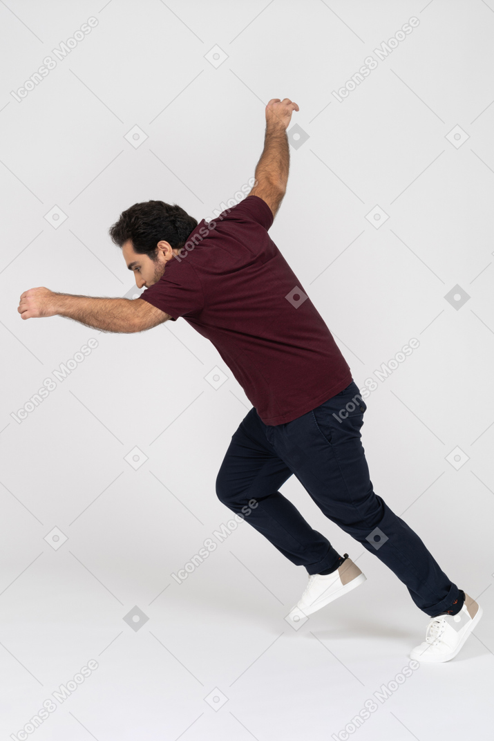 Man in casual clothes running away