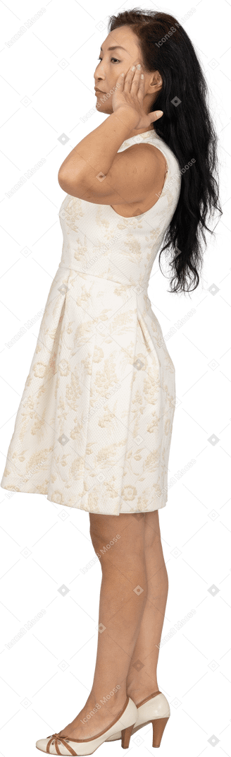 Woman in beautiful dress standing