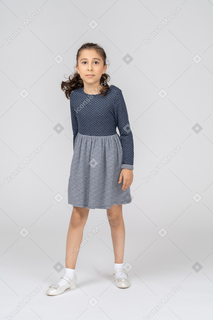 Front view of a girl taking a step to the side