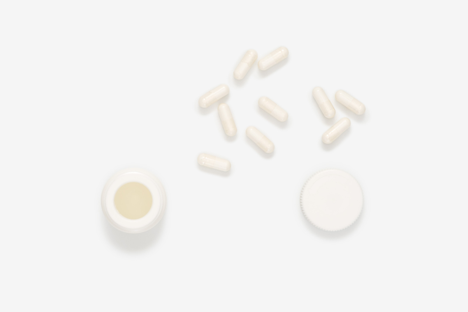 Scattered white pills