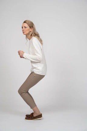 Woman in casual clothes standing