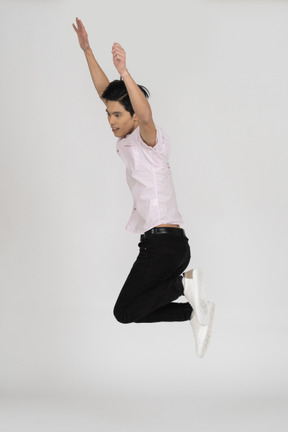 Man in casual clothes jumping