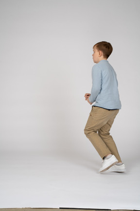 Side view of a running boy