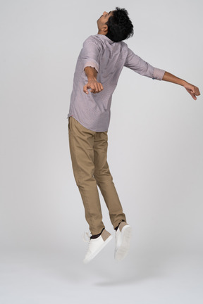 Man in casual clothes jumping