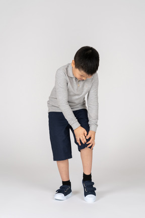 Boy having leg pain