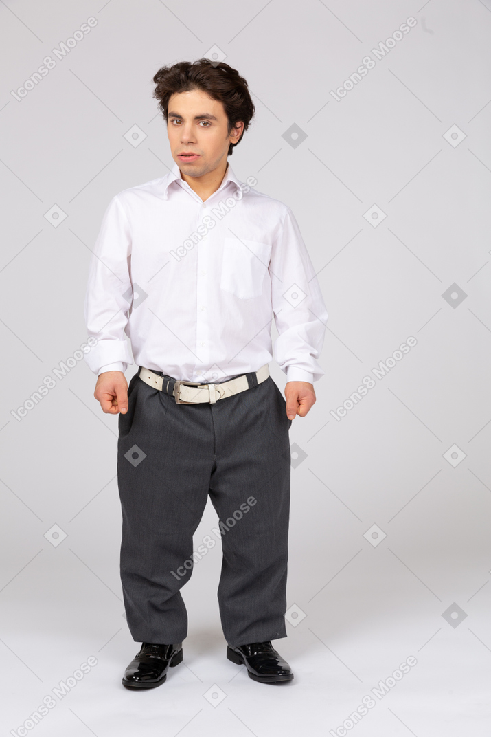 Man in business casual clothes looking at camera