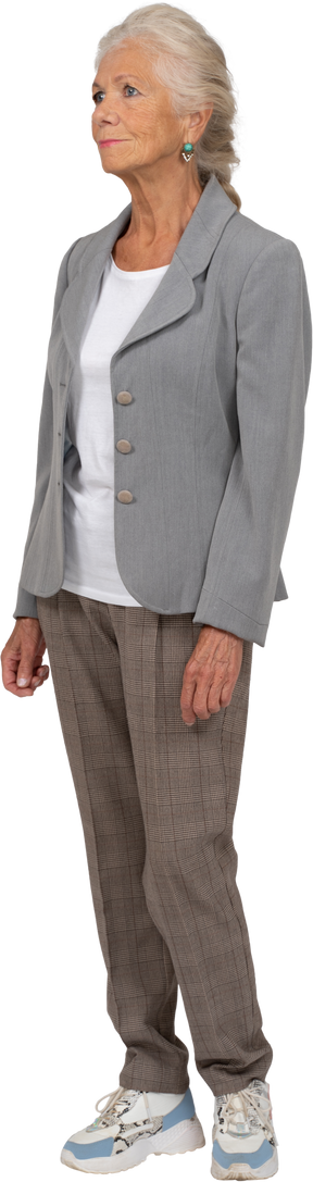 Side view of an old woman in suit