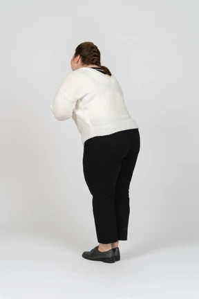Side view of a plump woman in casual clothes