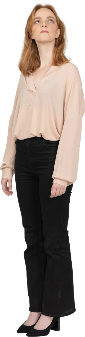 Woman in beautiful blouse standing