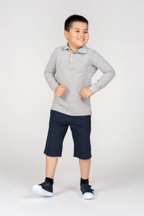 Cheerful boy dancing