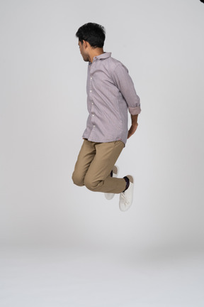 Man in casual clothes jumping