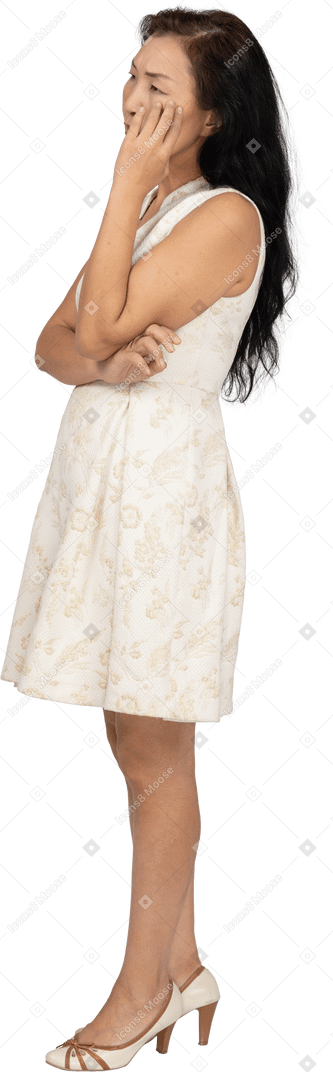 Woman in beautiful dress standing