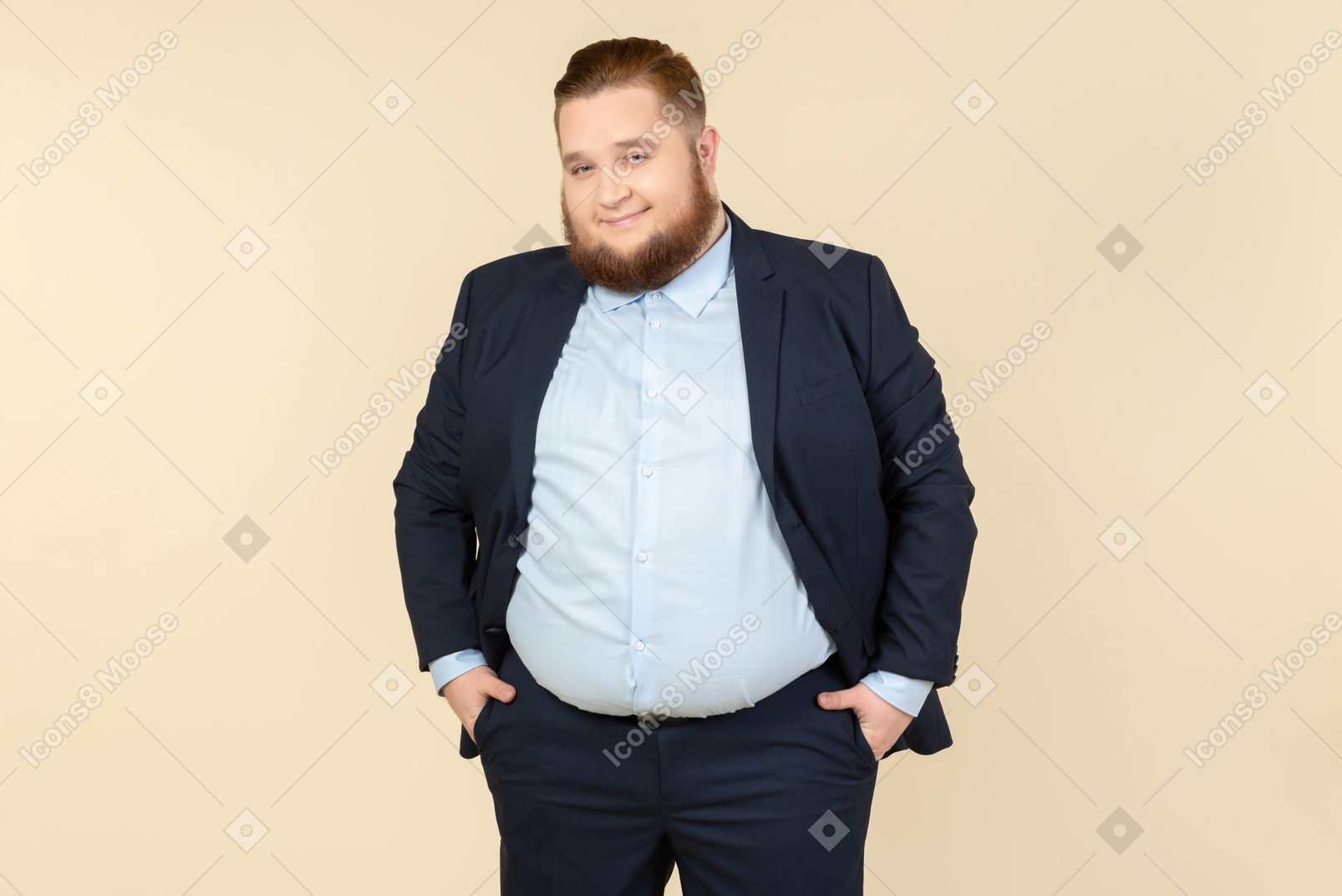 Happy looking young overweight man standing with hands in pockets
