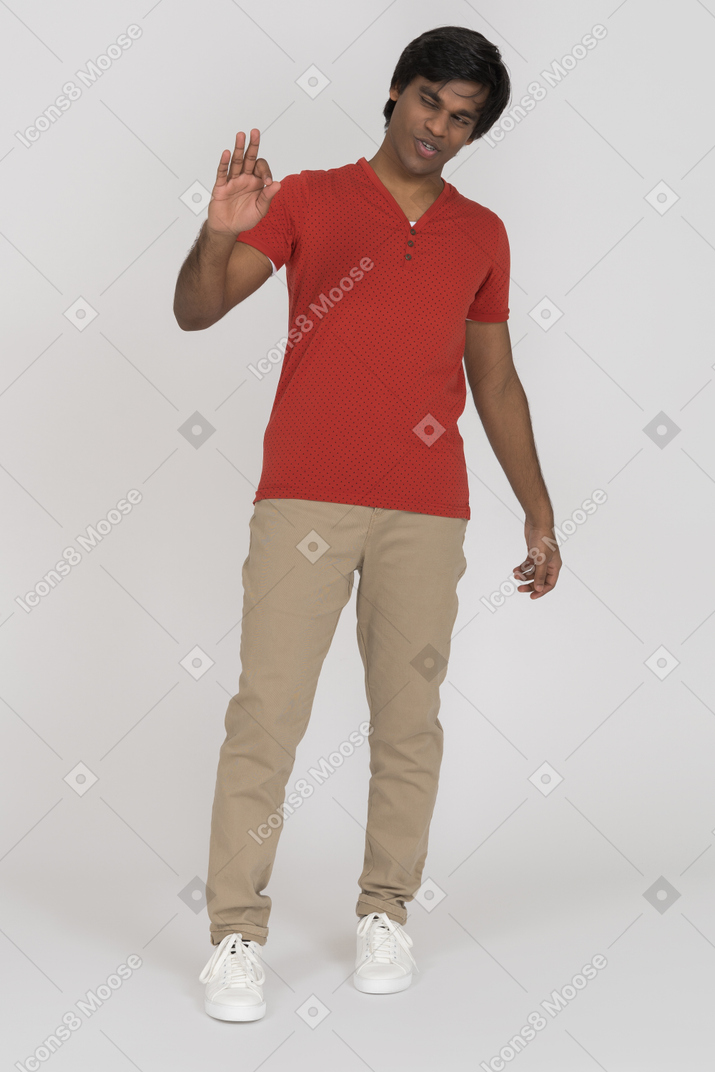 Young man gesturing and talking