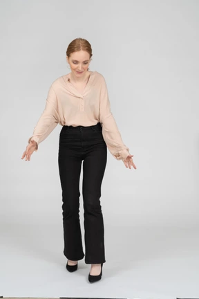 Woman in beautiful blouse standing