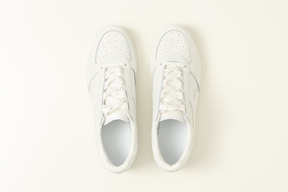 White sneakers on a white background