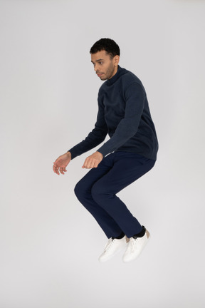 Man in black clothes jumping
