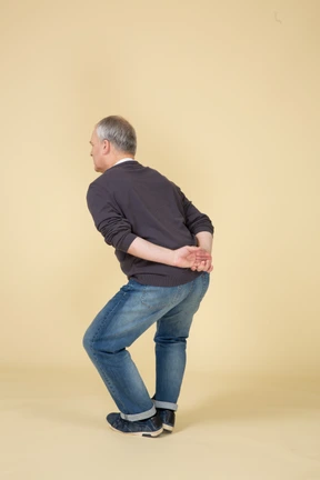 Man in casual clothes posing