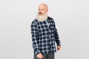 Bearded man looking angrily at someone