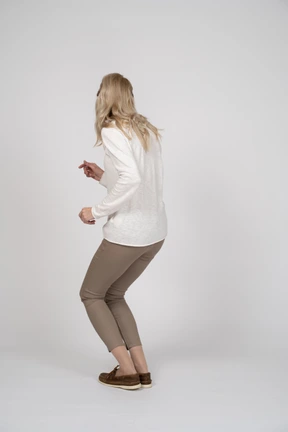 Woman in casual clothes standing