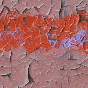 Old cracked paint layer on concrete wall