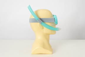 Swimming goggles on a mannequin head