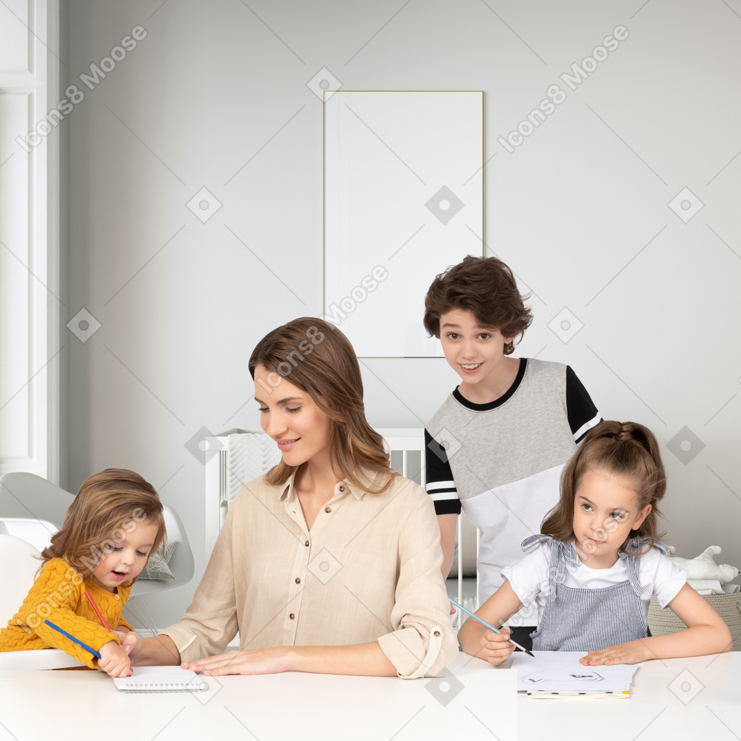 Mother and son writing on a paper