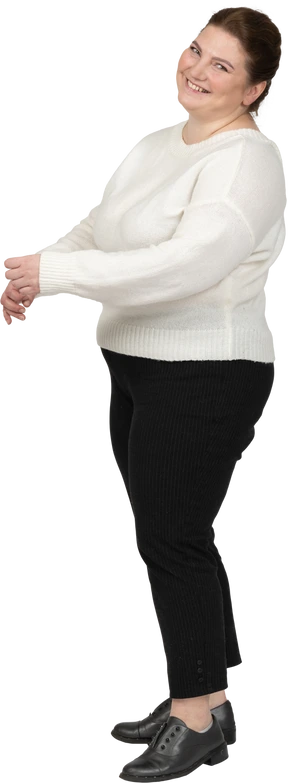 Happy plump woman standing in profile