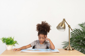 Cute girl doing homework