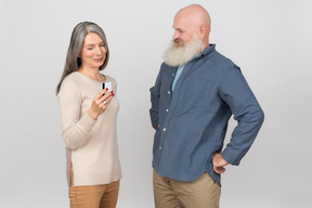 Elegant senior couple standing together