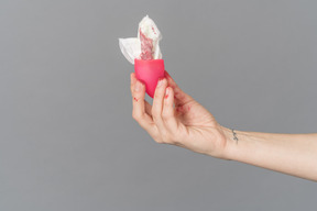 Used sanitary pad inside of a menstrual cup