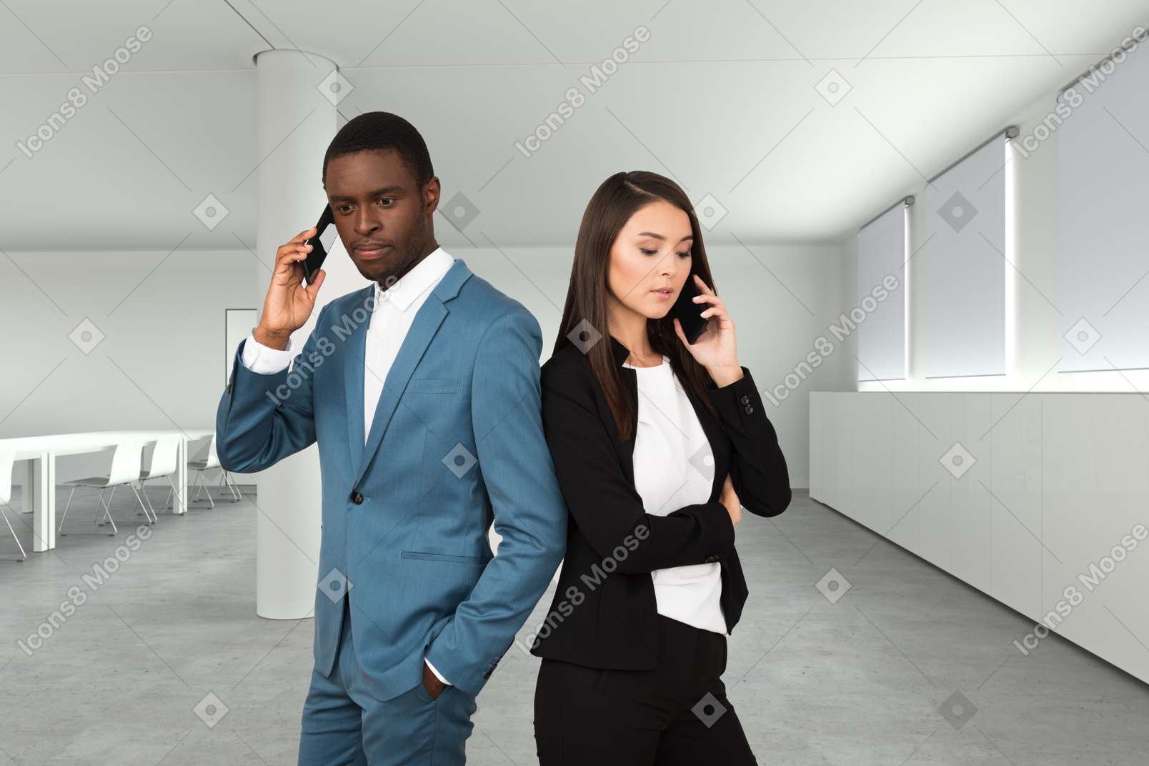 A man and a woman are talking on cell phones