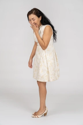 Woman in a white dress standing