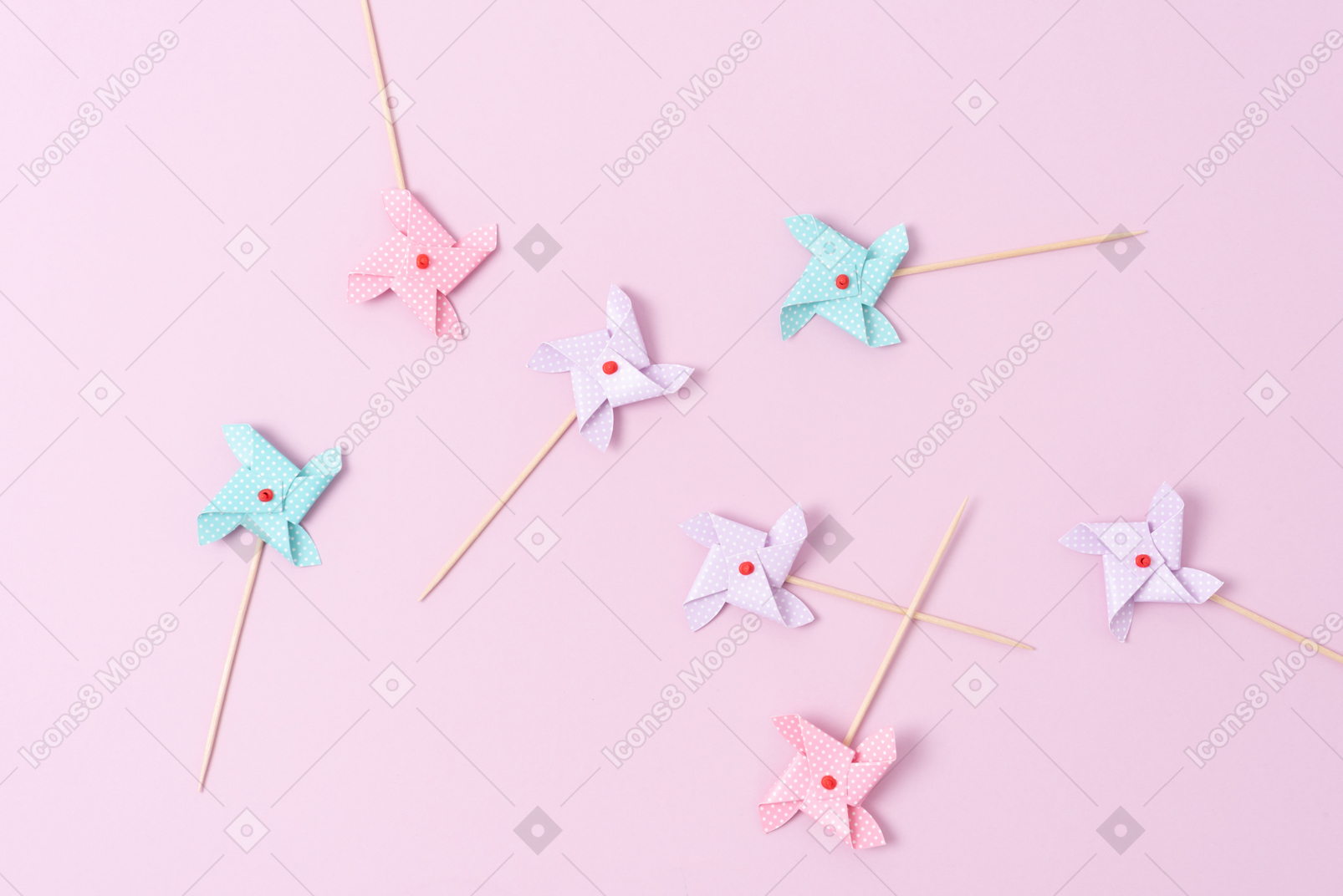 Pastel pinwheels on a pink background