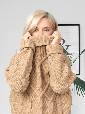 Young woman wearing a knitted sweater