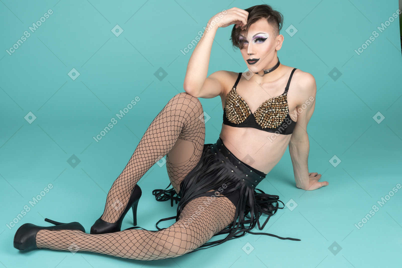 Full length portrait of a drag queen in all black outfit