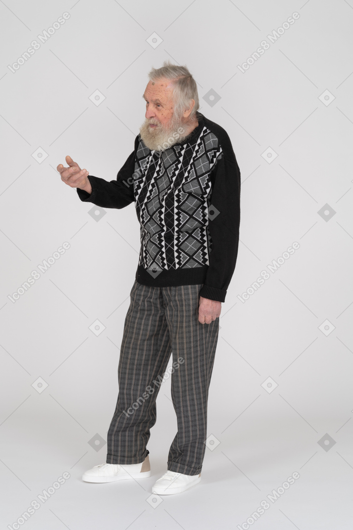 Anciano mostrando un signo de señas