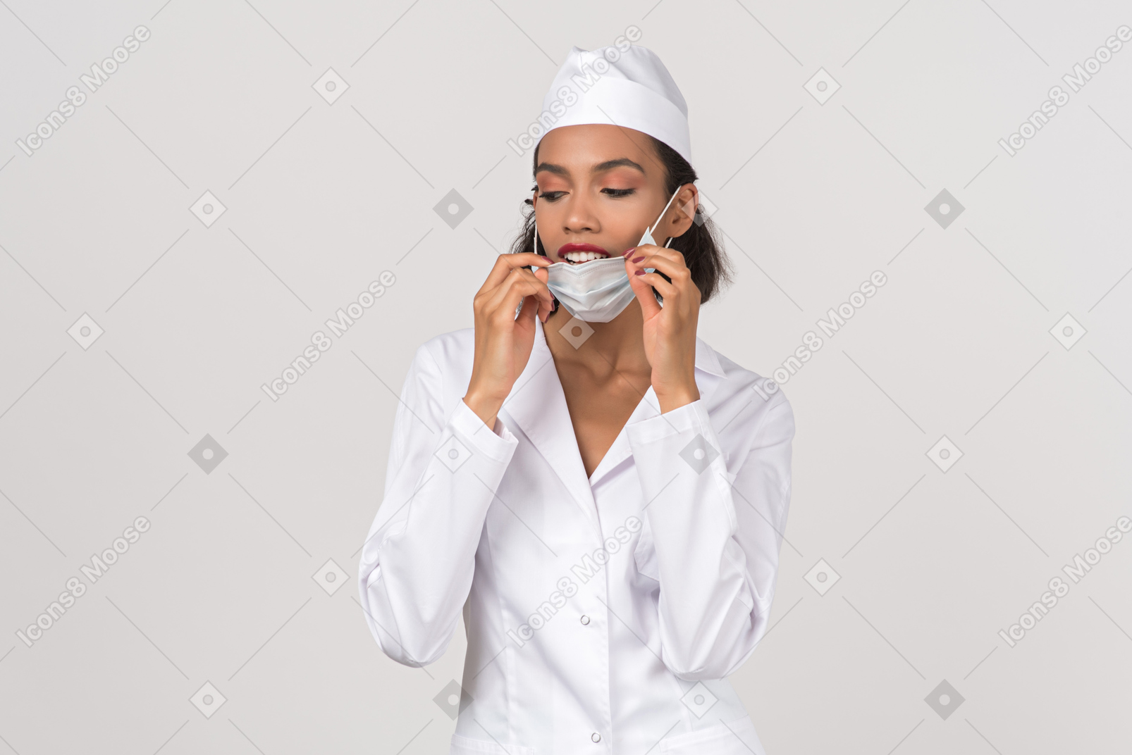 Attractive female doctor wearing a medical face mask