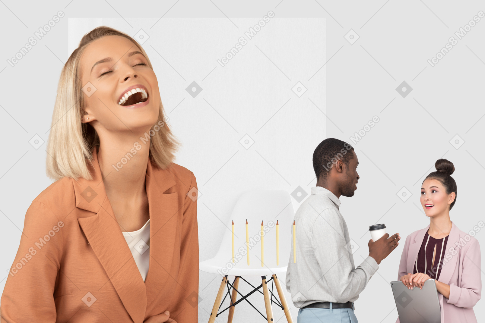A woman laughing at young couple