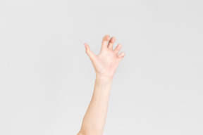 Female hand showing kind of scary gesture