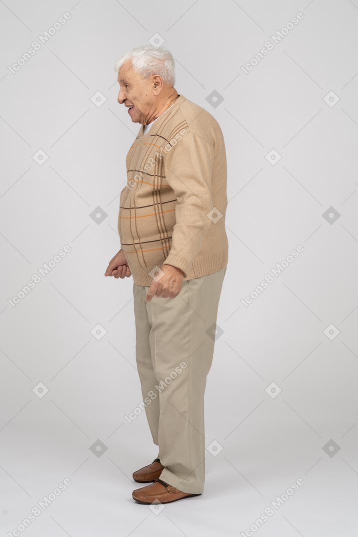 Side view of a happy old man in casual clothes