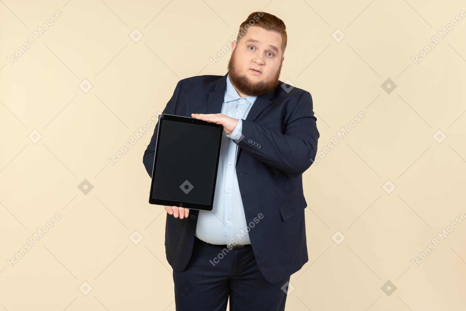 Young overweight man holding digital tablet vertically