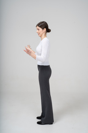 Side view of a woman gesturing
