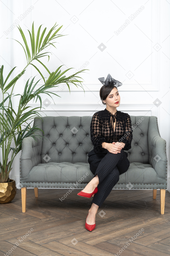 A woman sitting on a couch