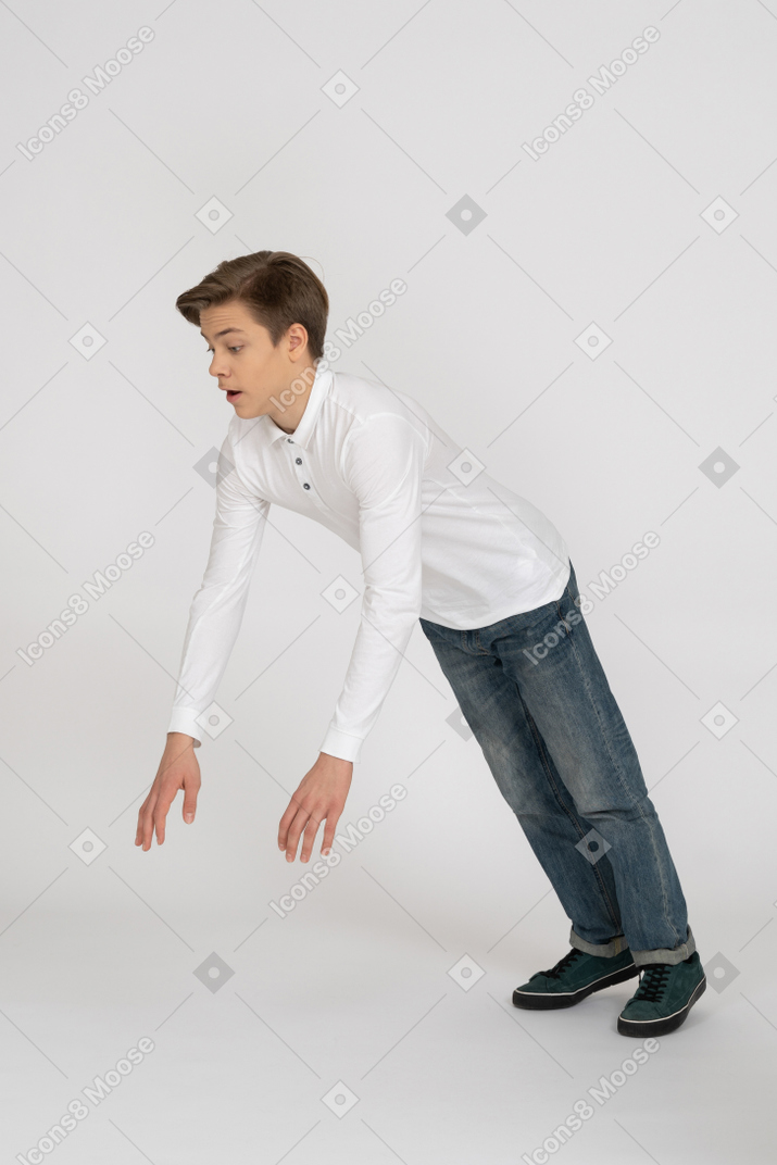 Young man in casual clothes falling