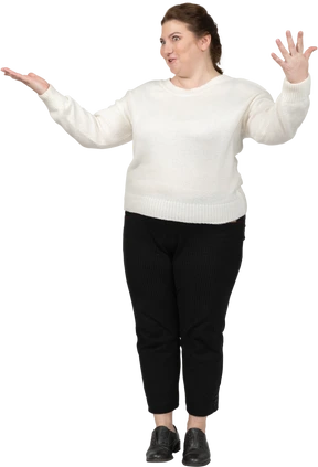 Front view of a happy plump woman in casual clothes gesturing