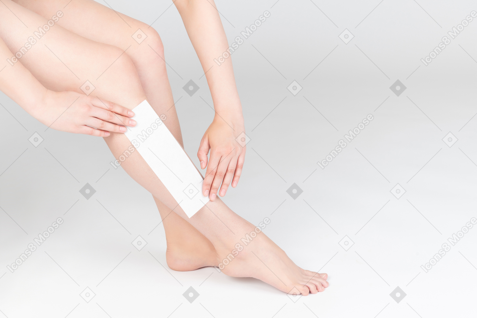 Tiro de piernas femeninas enceradas