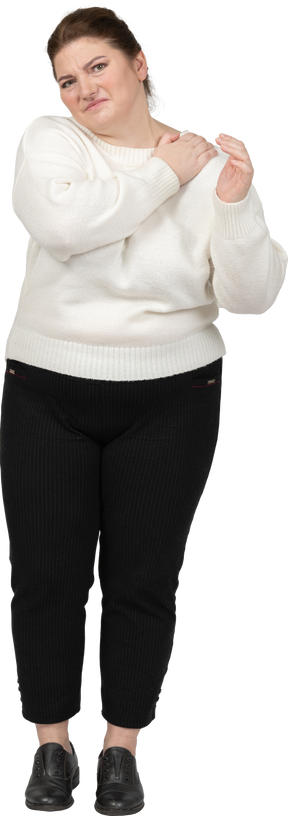 Front view of plump woman in casual clothes
